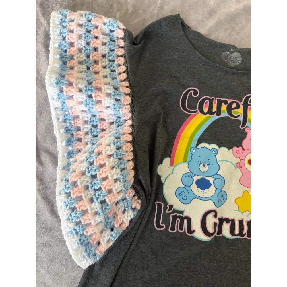 One of a Kind Upcycled Care Bears Graphic Tee with Hand Crocheted Sleeves Large